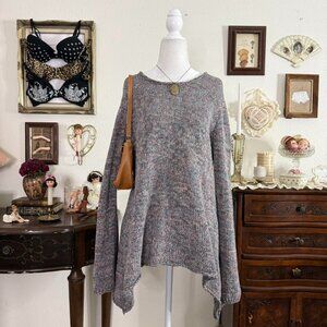 modern cozy whimsical multi colored sweater w fairy hem
